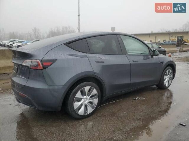 Серый Тесла Model Y, объемом двигателя 0 л и пробегом 35 тыс. км за 17000 $, фото 2 на Automoto.ua