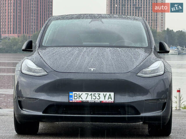 Серый Тесла Model Y, объемом двигателя 0 л и пробегом 66 тыс. км за 27900 $, фото 4 на Automoto.ua
