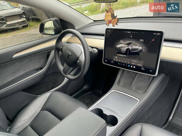 Серый Тесла Model Y, объемом двигателя 0 л и пробегом 41 тыс. км за 27500 $, фото 6 на Automoto.ua