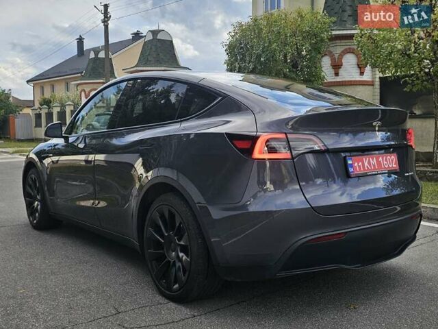 Серый Тесла Model Y, объемом двигателя 0 л и пробегом 38 тыс. км за 27900 $, фото 3 на Automoto.ua