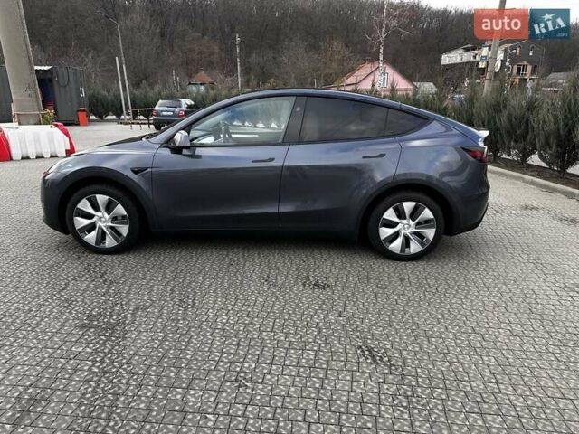 Серый Тесла Model Y, объемом двигателя 0 л и пробегом 24 тыс. км за 28399 $, фото 4 на Automoto.ua