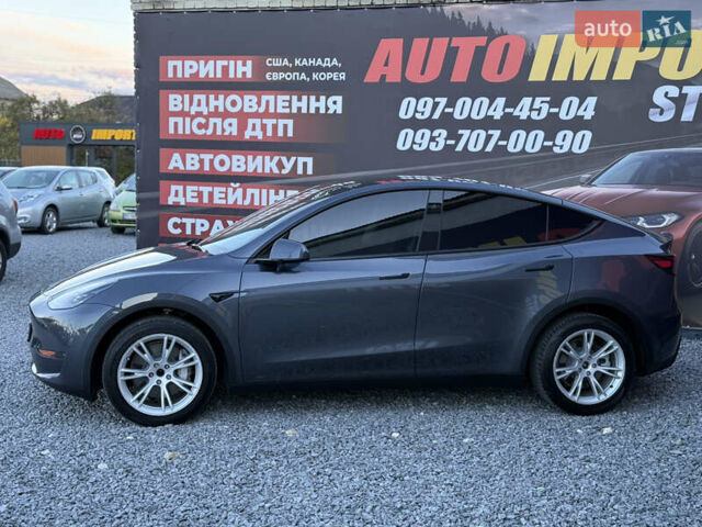 Сірий Тесла Model Y, об'ємом двигуна 0 л та пробігом 68 тис. км за 24499 $, фото 1 на Automoto.ua
