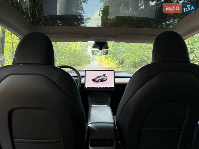 Серый Тесла Model Y, объемом двигателя 0 л и пробегом 32 тыс. км за 26500 $, фото 13 на Automoto.ua