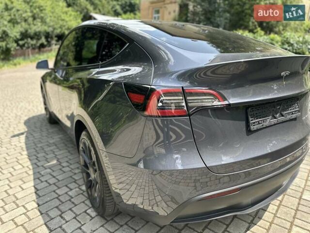Серый Тесла Model Y, объемом двигателя 0 л и пробегом 55 тыс. км за 25100 $, фото 31 на Automoto.ua