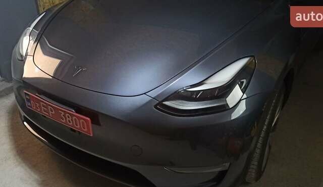 Серый Тесла Model Y, объемом двигателя 0 л и пробегом 46 тыс. км за 31000 $, фото 1 на Automoto.ua