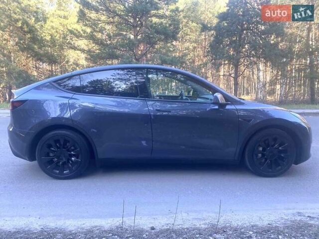Серый Тесла Model Y, объемом двигателя 0 л и пробегом 42 тыс. км за 27500 $, фото 1 на Automoto.ua