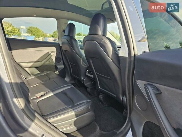 Серый Тесла Model Y, объемом двигателя 0 л и пробегом 34 тыс. км за 28300 $, фото 20 на Automoto.ua