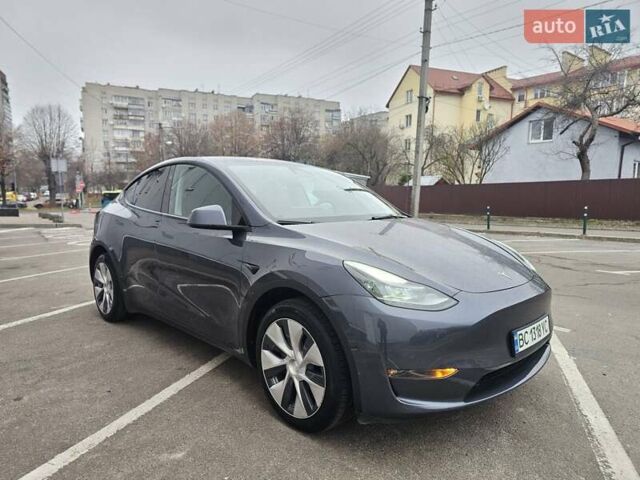 Серый Тесла Model Y, объемом двигателя 0 л и пробегом 23 тыс. км за 27000 $, фото 1 на Automoto.ua
