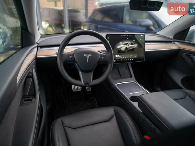 Серый Тесла Model Y, объемом двигателя 0 л и пробегом 61 тыс. км за 32500 $, фото 17 на Automoto.ua