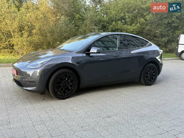 Серый Тесла Model Y, объемом двигателя 0 л и пробегом 49 тыс. км за 27000 $, фото 2 на Automoto.ua