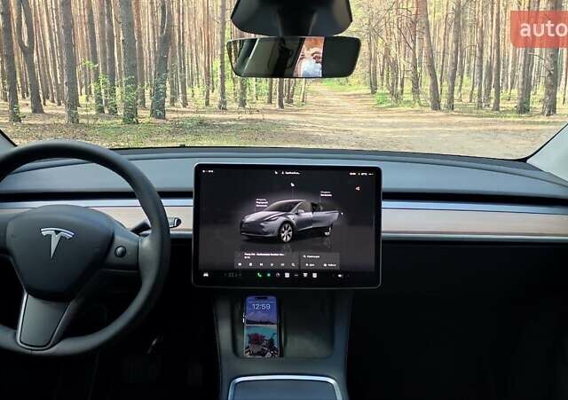 Серый Тесла Model Y, объемом двигателя 0 л и пробегом 15 тыс. км за 27100 $, фото 5 на Automoto.ua
