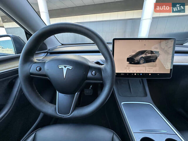 Серый Тесла Model Y, объемом двигателя 0 л и пробегом 93 тыс. км за 27900 $, фото 14 на Automoto.ua