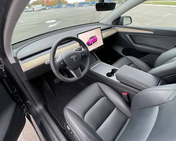 Серый Тесла Model Y, объемом двигателя 0 л и пробегом 51 тыс. км за 28900 $, фото 13 на Automoto.ua