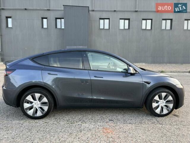 Серый Тесла Model Y, объемом двигателя 0 л и пробегом 22 тыс. км за 28999 $, фото 5 на Automoto.ua