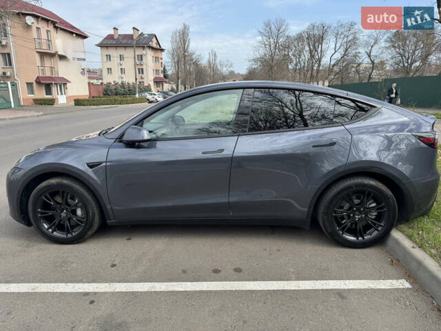 Серый Тесла Model Y, объемом двигателя 0 л и пробегом 30 тыс. км за 32000 $, фото 3 на Automoto.ua