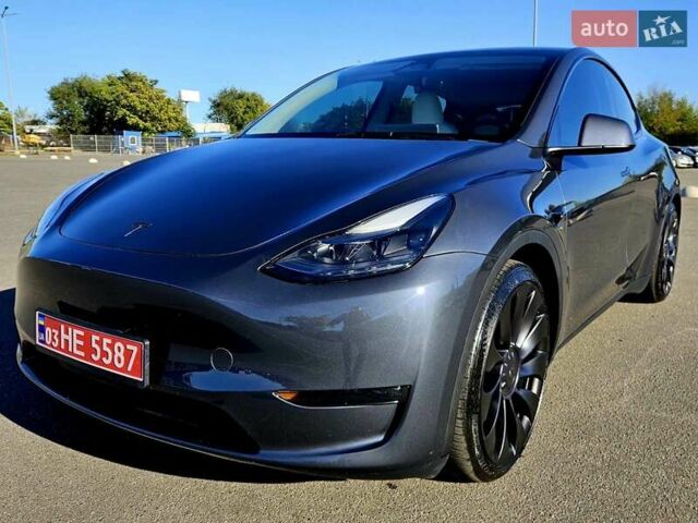 Серый Тесла Model Y, объемом двигателя 0 л и пробегом 29 тыс. км за 27900 $, фото 1 на Automoto.ua