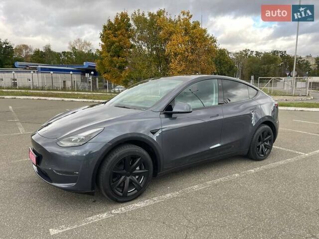 Серый Тесла Model Y, объемом двигателя 0 л и пробегом 51 тыс. км за 28900 $, фото 3 на Automoto.ua