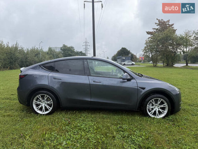 Серый Тесла Model Y, объемом двигателя 0 л и пробегом 44 тыс. км за 26900 $, фото 2 на Automoto.ua