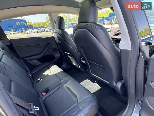Серый Тесла Model Y, объемом двигателя 0 л и пробегом 28 тыс. км за 29000 $, фото 44 на Automoto.ua