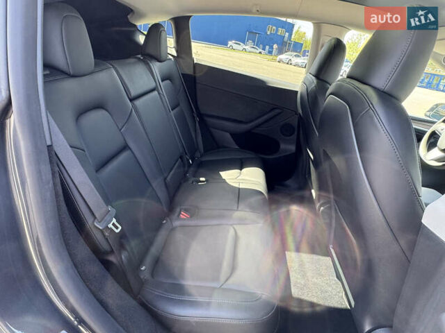 Серый Тесла Model Y, объемом двигателя 0 л и пробегом 28 тыс. км за 29000 $, фото 43 на Automoto.ua
