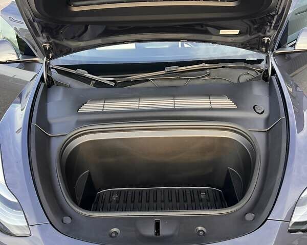 Серый Тесла Model Y, объемом двигателя 0 л и пробегом 22 тыс. км за 28999 $, фото 18 на Automoto.ua