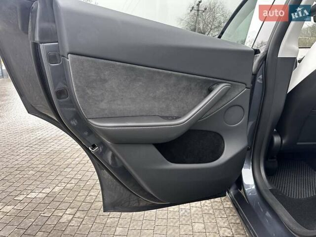 Серый Тесла Model Y, объемом двигателя 0 л и пробегом 24 тыс. км за 28399 $, фото 22 на Automoto.ua