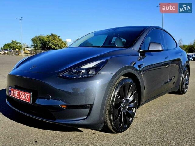Серый Тесла Model Y, объемом двигателя 0 л и пробегом 29 тыс. км за 27900 $, фото 2 на Automoto.ua