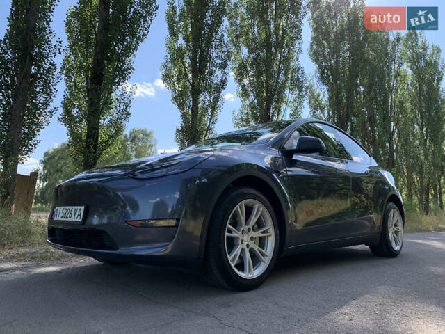 Серый Тесла Model Y, объемом двигателя 0 л и пробегом 47 тыс. км за 28028 $, фото 4 на Automoto.ua