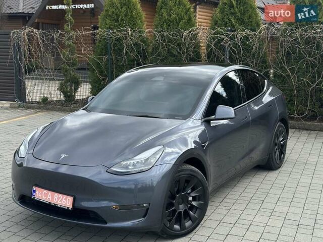Серый Тесла Model Y, объемом двигателя 0 л и пробегом 9 тыс. км за 28950 $, фото 1 на Automoto.ua
