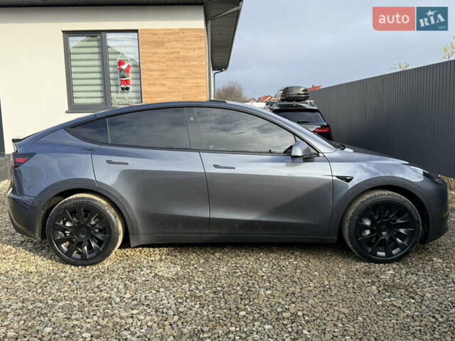 Сірий Тесла Model Y, об'ємом двигуна 0 л та пробігом 28 тис. км за 27900 $, фото 25 на Automoto.ua