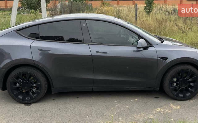 Серый Тесла Model Y, объемом двигателя 0 л и пробегом 57 тыс. км за 31333 $, фото 2 на Automoto.ua