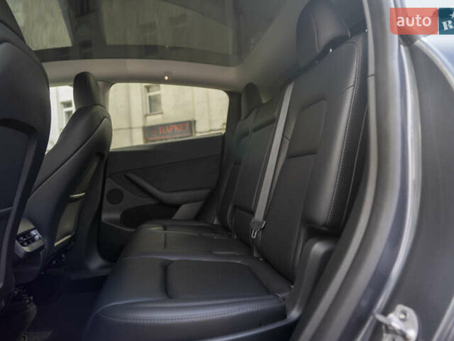 Серый Тесла Model Y, объемом двигателя 0 л и пробегом 24 тыс. км за 31900 $, фото 20 на Automoto.ua