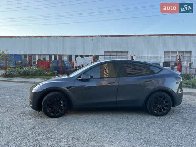 Серый Тесла Model Y, объемом двигателя 0 л и пробегом 55 тыс. км за 30800 $, фото 3 на Automoto.ua