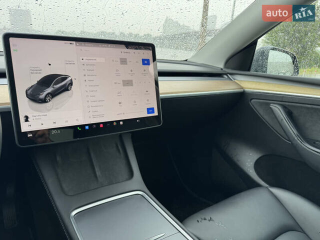Серый Тесла Model Y, объемом двигателя 0 л и пробегом 66 тыс. км за 27900 $, фото 20 на Automoto.ua