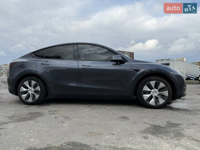 Серый Тесла Model Y, объемом двигателя 0 л и пробегом 31 тыс. км за 26999 $, фото 3 на Automoto.ua