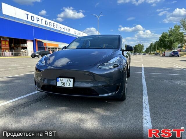 Серый Тесла Model Y, объемом двигателя 0 л и пробегом 13 тыс. км за 28650 $, фото 1 на Automoto.ua
