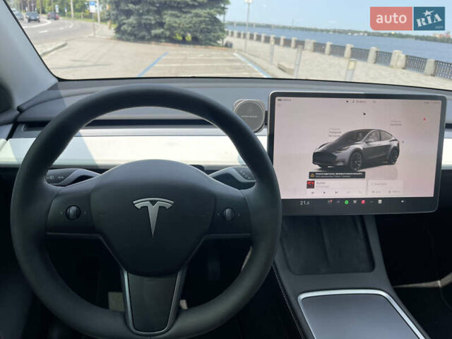 Серый Тесла Model Y, объемом двигателя 0 л и пробегом 24 тыс. км за 30500 $, фото 25 на Automoto.ua