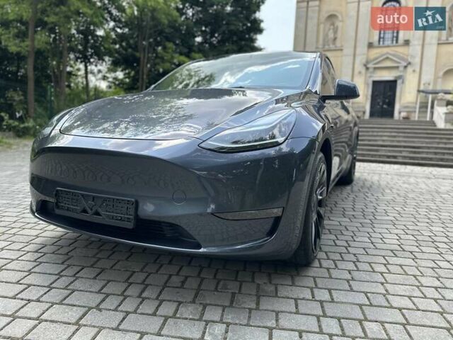 Серый Тесла Model Y, объемом двигателя 0 л и пробегом 55 тыс. км за 25100 $, фото 19 на Automoto.ua