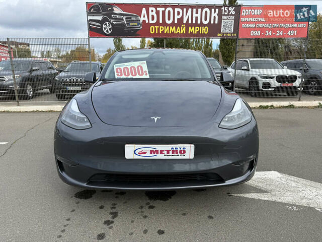 Серый Тесла Model Y, объемом двигателя 0 л и пробегом 71 тыс. км за 28900 $, фото 6 на Automoto.ua