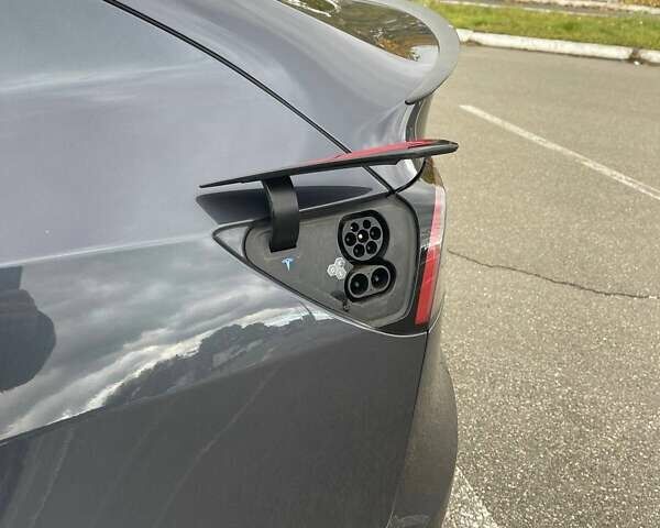 Серый Тесла Model Y, объемом двигателя 0 л и пробегом 51 тыс. км за 28900 $, фото 10 на Automoto.ua