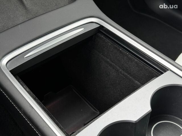 Серый Тесла Model Y, объемом двигателя 0 л и пробегом 22 тыс. км за 25990 $, фото 16 на Automoto.ua