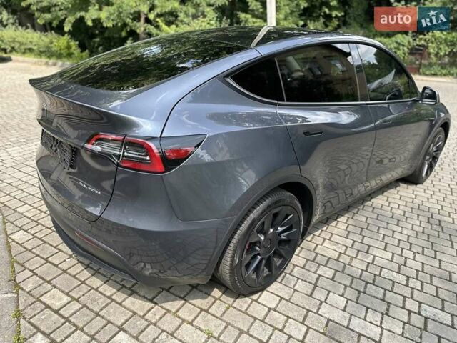 Серый Тесла Model Y, объемом двигателя 0 л и пробегом 55 тыс. км за 25100 $, фото 27 на Automoto.ua