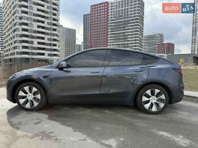 Серый Тесла Model Y, объемом двигателя 0 л и пробегом 31 тыс. км за 26999 $, фото 1 на Automoto.ua
