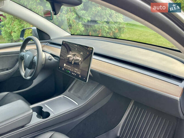 Сірий Тесла Model Y, об'ємом двигуна 0 л та пробігом 21 тис. км за 26300 $, фото 17 на Automoto.ua