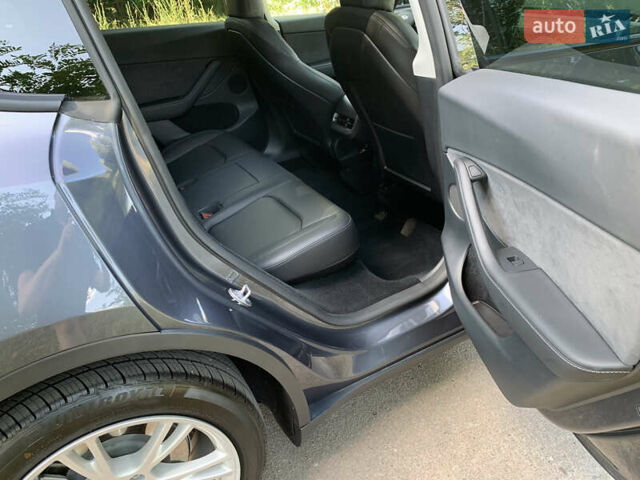Серый Тесла Model Y, объемом двигателя 0 л и пробегом 47 тыс. км за 28028 $, фото 26 на Automoto.ua