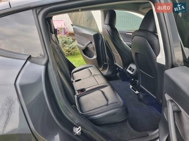 Серый Тесла Model Y, объемом двигателя 0 л и пробегом 19 тыс. км за 27900 $, фото 29 на Automoto.ua