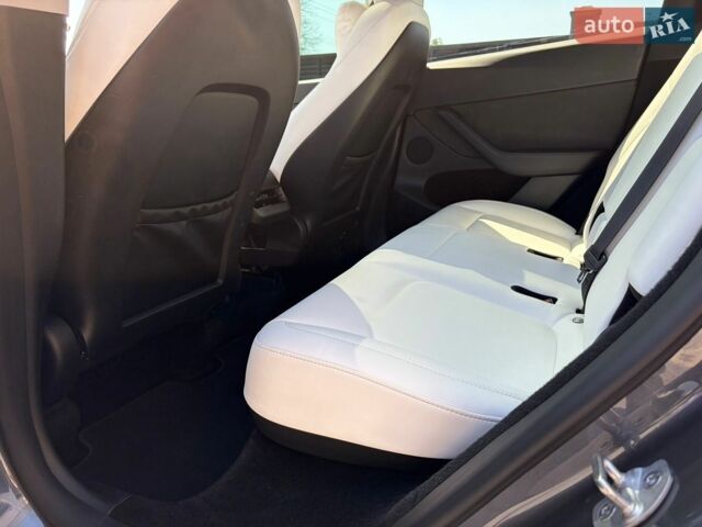 Серый Тесла Model Y, объемом двигателя 0 л и пробегом 93 тыс. км за 26500 $, фото 15 на Automoto.ua