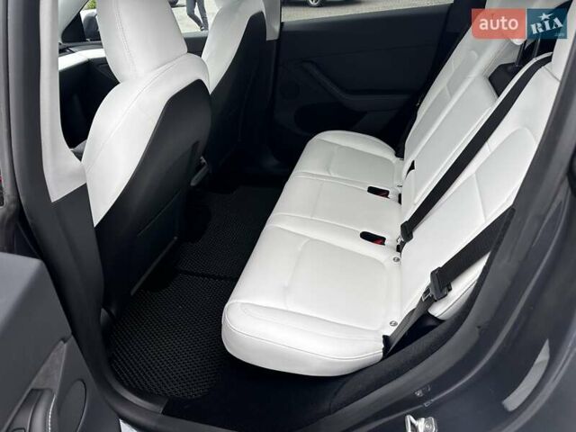 Серый Тесла Model Y, объемом двигателя 0 л и пробегом 24 тыс. км за 28399 $, фото 21 на Automoto.ua