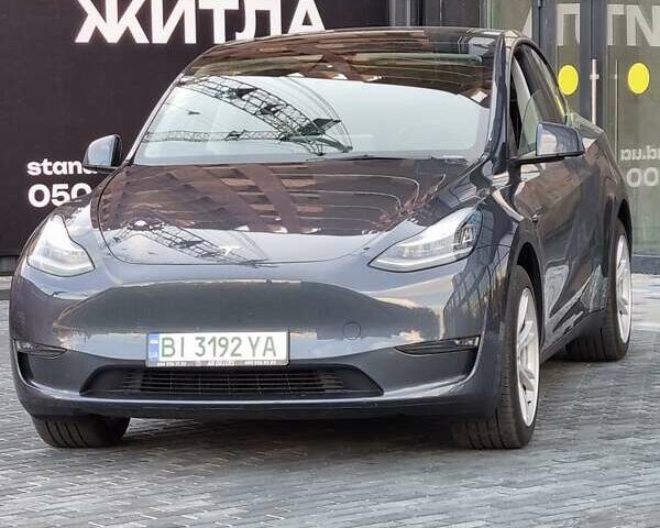 Серый Тесла Model Y, объемом двигателя 0 л и пробегом 28 тыс. км за 34999 $, фото 2 на Automoto.ua