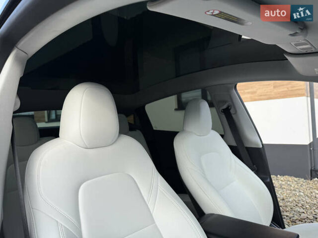 Сірий Тесла Model Y, об'ємом двигуна 0 л та пробігом 28 тис. км за 27900 $, фото 53 на Automoto.ua